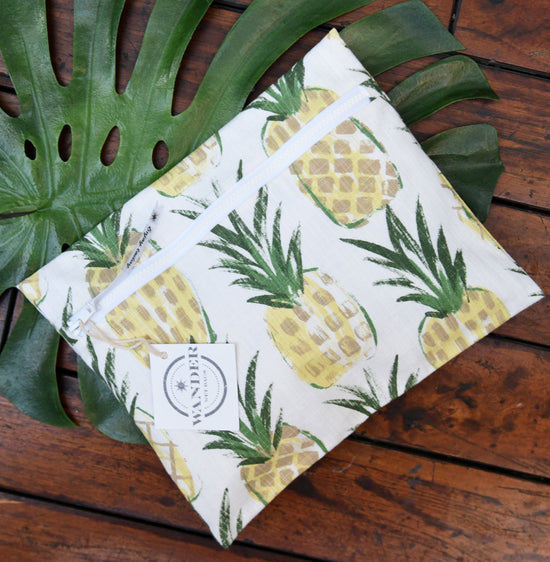 Wear a Crown in Pineapple Wet Bag , on wood background